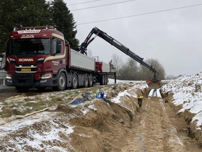 Levering af materialer med grab